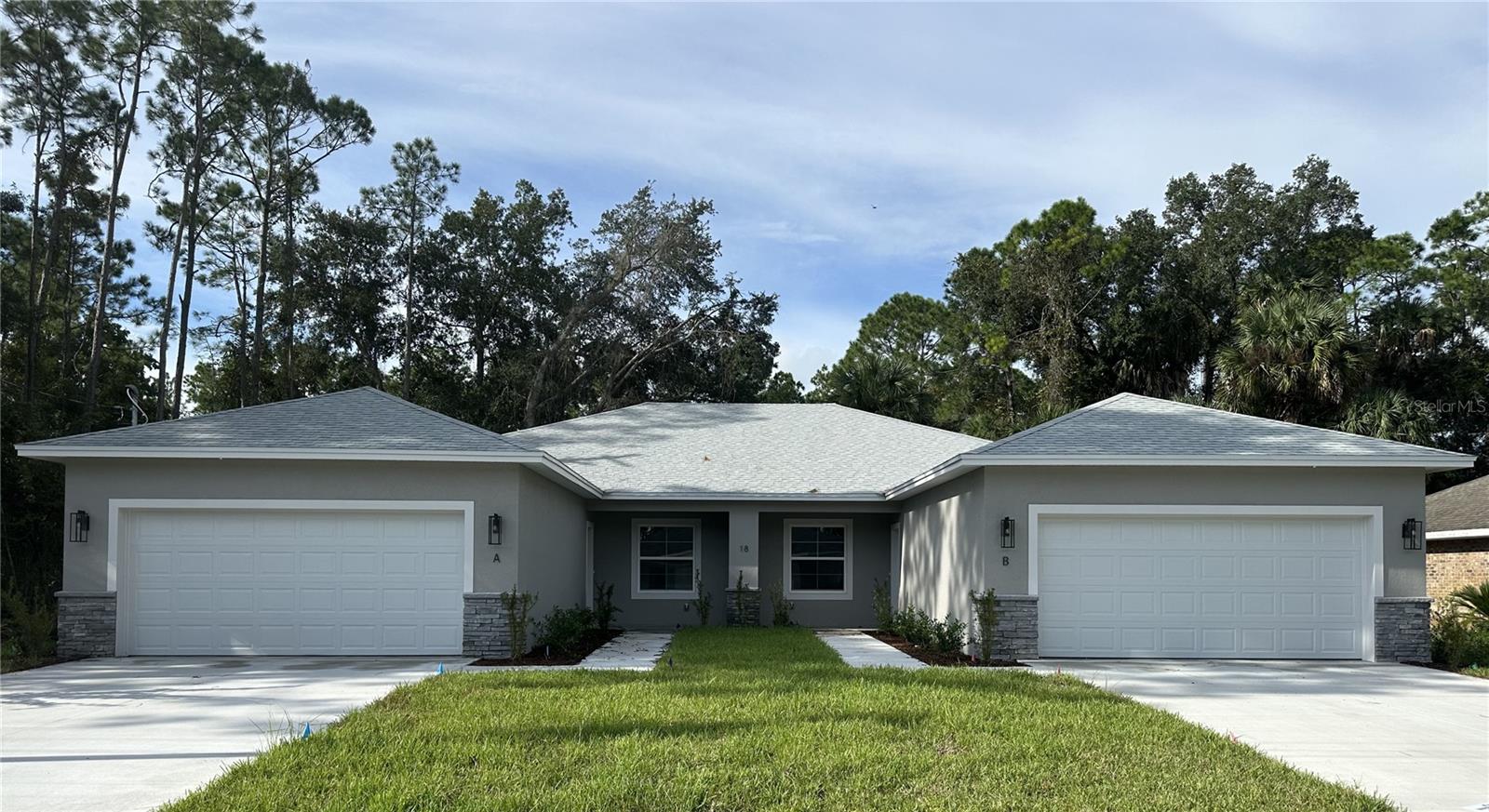 Welcome to this stunning 3 bedroom, 2 bathroom, 2 car garage 1/2 duplex located in Palm Coast, FL. This well constructed duplex has a modern and sleek design that is perfect for those looking for a stylish and comfortable living space. Features: stainless appliances, tile and laminate flooring throughout, granite countertops and high ceilings that create a spacious and airy atmosphere. The interior laundry room provides convenience and functionality for everyday living. Don't miss out on the opportunity to make this 1/2 duplex your new home.
Lawn care included. Contact us today for more information.
(pictures are prior to current tenant)
No Smoking
Pets considered, non-refundable fee and monthly pet rent
1st months rent of $1995.00, Security deposit of $2000.00, screening fee $30.00 per 18 year old and over, lease prep of $50.00 & Resident Benefits Package is an additional $40 monthly fee.
All Clarion Group, Inc. residents are enrolled in the Resident Benefits Package (RBP) for $40.00/month which includes renters insurance, HVAC air filter delivery (for applicable properties), credit building to help boost your credit score with timely rent payments, $1M Identity Protection, move-in concierge service making utility connection and home service setup a breeze during your move-in, our best-in-class resident rewards program, and much more! More details upon application.