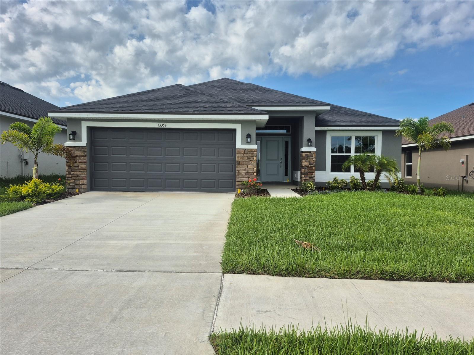 ** SPECIAL INCENTIVES AVAILABLE ON THIS HOME** Welcome to 1820B! One story 4 bedrooms and 2 baths, 5 ¼” baseboards, 5-panel doors for every room, brushed nickel cabinet knobs as well as tile throughout the living and wet areas. The master bath is equipped with double vanity sinks and a separate tub and shower! The kitchen boasts 36" upper custom wood cabinets with crown molding, a OneTouch gooseneck faucet, granite countertops, and a large island workspace that overlooks the great room - perfect for entertaining guests and family! This home includes a glass-top range, dishwasher, and microwave, as well as a 15 SEER air conditioner! Pest-free living with your built-in pest control system we include in every home! All our Homes come with Adams Homes' legendary building quality, attention to detail, and outstanding customer service. Let's make this home your New Dream Home!