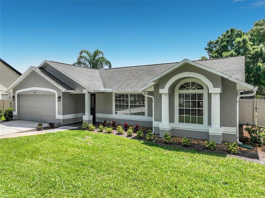 Beautifully renovated 3-bedroom, 2-bath split-plan home situated on a fenced corner lot with exceptional indoor and outdoor living spaces. This move-in ready home features luxury vinyl plank flooring throughout, quartz countertops, and a spacious layout including formal living and dining rooms, a cozy family room, and an eat-in kitchen perfect for everyday living and entertaining.The private primary suite offers a walk-in closet, dual sinks, and an oversized custom shower. Enjoy relaxing mornings or entertaining guests on the impressive 28x10 tiled screened lanai. Additional highlights include all appliances, sprinkler system, and plenty of natural light throughout. Roof Replaced 9/2020. Conveniently located near I-4 and 417 with easy access to shopping, dining, and entertainment.