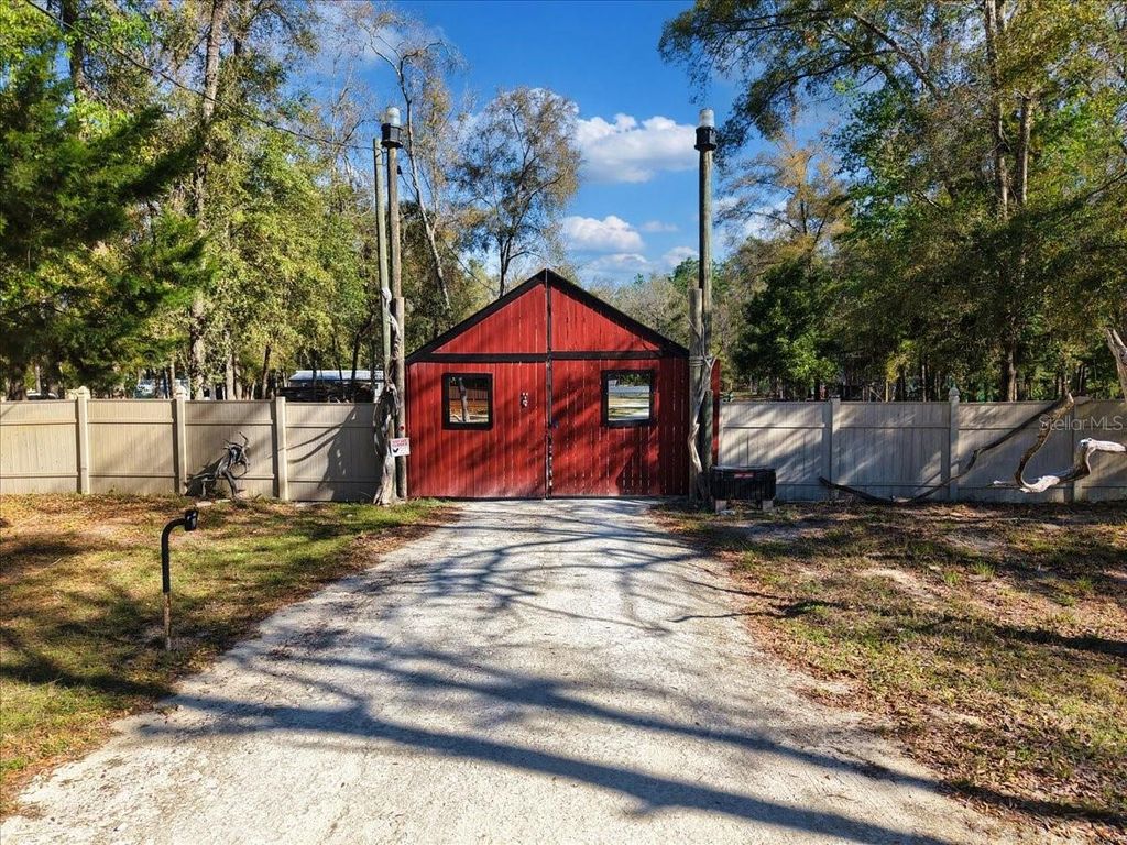 Photo of 5850 NW 50th Street, Bell, FL 32619 (MLS # W7884110)
