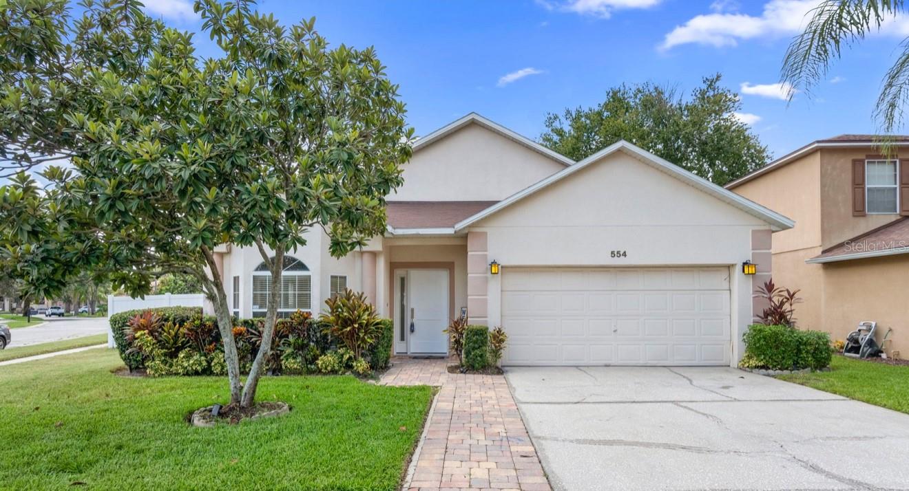Nestled on a spacious corner lot in the highly sought-after Pines of Wekiva community, this beautifully updated 4-bedroom, 2-bathroom home is truly move-in ready. From the moment you enter the neighborhood, you’ll be greeted by a long, tree-lined entrance that sets the tone for the charm and tranquility ahead.
Step inside and discover bright, open living spaces with no carpet—just stylish, easy-to-maintain hard flooring throughout. The modern kitchen is a showstopper, featuring granite countertops, updated appliances, and plenty of cabinet space for all your cooking needs.
The primary suite is a peaceful retreat with a spa-like ensuite bathroom, complete with an updated shower stall, soaking tub, and separate water closet. The split floor plan offers privacy, while the separate living and dining rooms provide flexible space for both entertaining and everyday living.
Enjoy Florida’s year-round sunshine from your screened-in lanai, perfect for indoor-outdoor living, overlooking a fully fenced backyard with lush, well-manicured landscaping. And here’s a sweet bonus—do you love mangoes and lemons? You’ll have your very own trees right in your backyard, ready to enjoy season after season!
Location is everything! Just 5 minutes from Publix, 10 minutes to Kelly Park, 14 minutes to Apopka Amphitheatre, and only 45 minutes to Orlando’s world-famous theme parks and the airport. Plus, you’re just 15 minutes from the much-anticipated Wyld Oaks entertainment destination.
Don’t miss your chance to own this incredible home in one of Central Florida’s most desirable areas—schedule your private tour today!