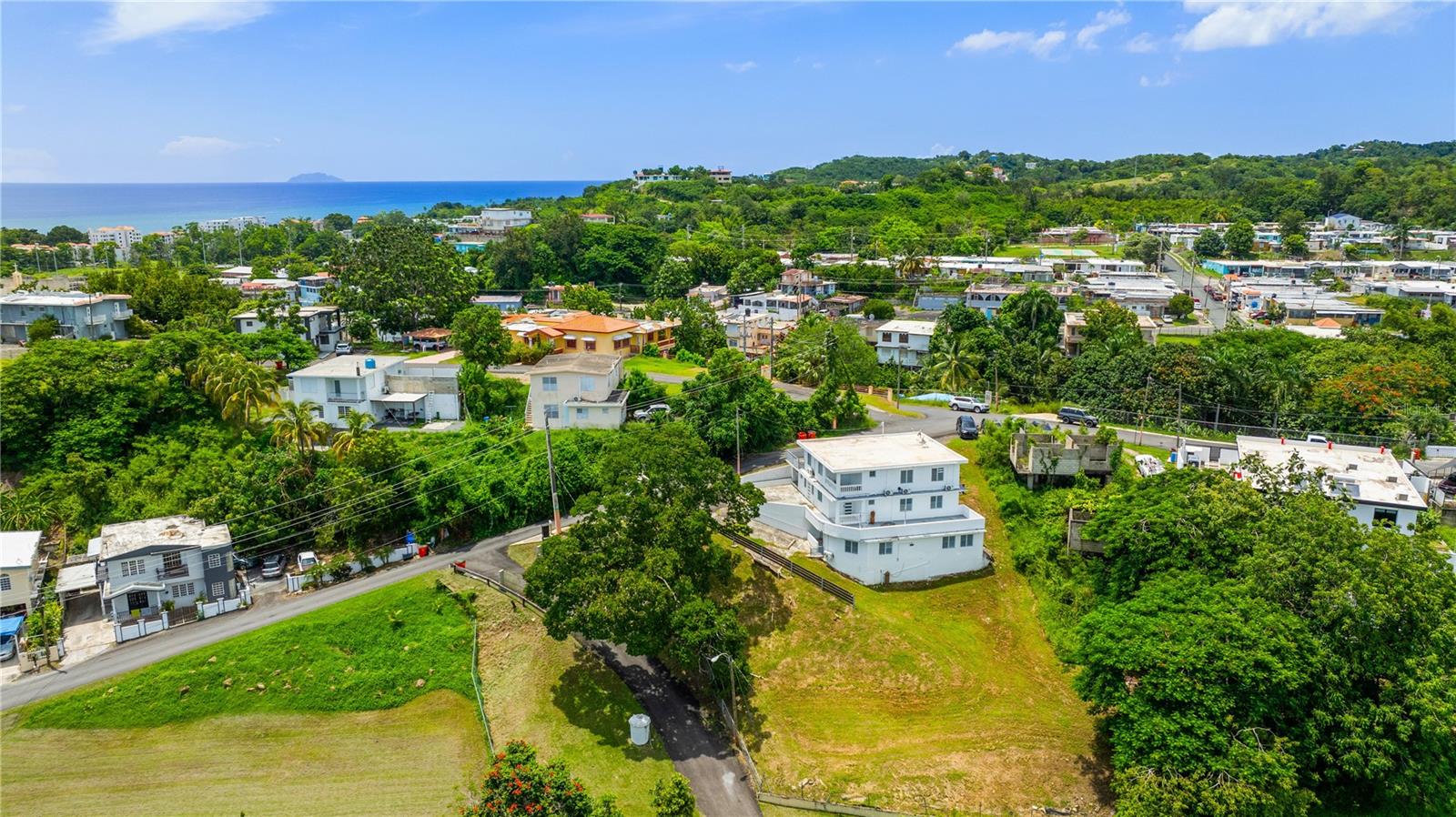 Prime Turnkey Multifamily Investment Opportunity in Rincon, Puerto Rico
Discover a rare investment opportunity in Rincon, Puerto Rico, the "Surf Capital of the Caribbean," with this turnkey multifamily property located in the heart of Rincon Town Center. This fully operational property offers a solid return on investment with both short-term and long-term rental potential. Situated walking distance to Rincon’s lively town square, it offers tenants a perfect balance of residential tranquility and easy access to numerous restaurants, bars, and local shops. The stunning Rincon beaches are also just a short drive away, ensuring the property is poised to attract year-round rental demand.
This property spans three levels and features five separate apartments, each with its own private kitchen, living area, and bathroom, all equipped with air conditioning for optimal comfort. The first level includes a 1-bedroom, 1-bath apartment and a 2-bedroom, 1-bath apartment with a balcony, offering a cozy and welcoming living space. The second level houses two 2-bedroom, 1-bath apartments, both featuring spacious walkout terraces. The ground level includes a 3-bedroom, 1-bath apartment with ample living space. Each unit is designed for tenant convenience, with multiple parking spaces and a laundry facility located on the lower level.
The property sits on a 1,417 m² lot, providing plenty of room for future development or additional amenities, which could increase both rental income and overall property value. The mixed zoning offers flexibility for potential expansion, adding even more value to this already promising investment. Gross Building Area of 3,908 SF. and a Gross Living Area of 3,153 SF, this property is an excellent opportunity for both experienced and new investors.
Rincon’s growing popularity as a tourist and residential destination makes this property an excellent choice for anyone seeking to capitalize on the area's continued appreciation and demand. Whether you are looking to enter the lucrative short-term rental market or secure long-term rental income, this multifamily property offers flexibility and potential for significant returns. With easy access to the town center and nearby beaches, it offers the perfect mix of convenience, comfort, and prime location.
This is your chance to invest in a thriving market at an attractive price. Don’t miss out on this exceptional multifamily opportunity in Rincon. Contact us today for more information and to schedule a tour.