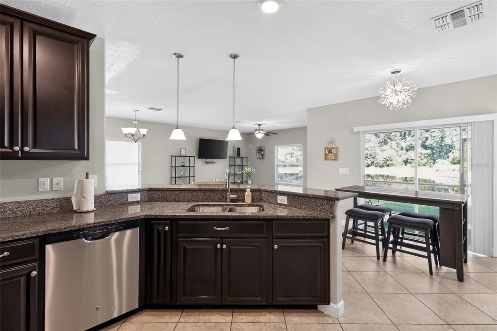Photo of 1677 Ludington Avenue, Wesley Chapel, FL 33543 (MLS # TB8548224)