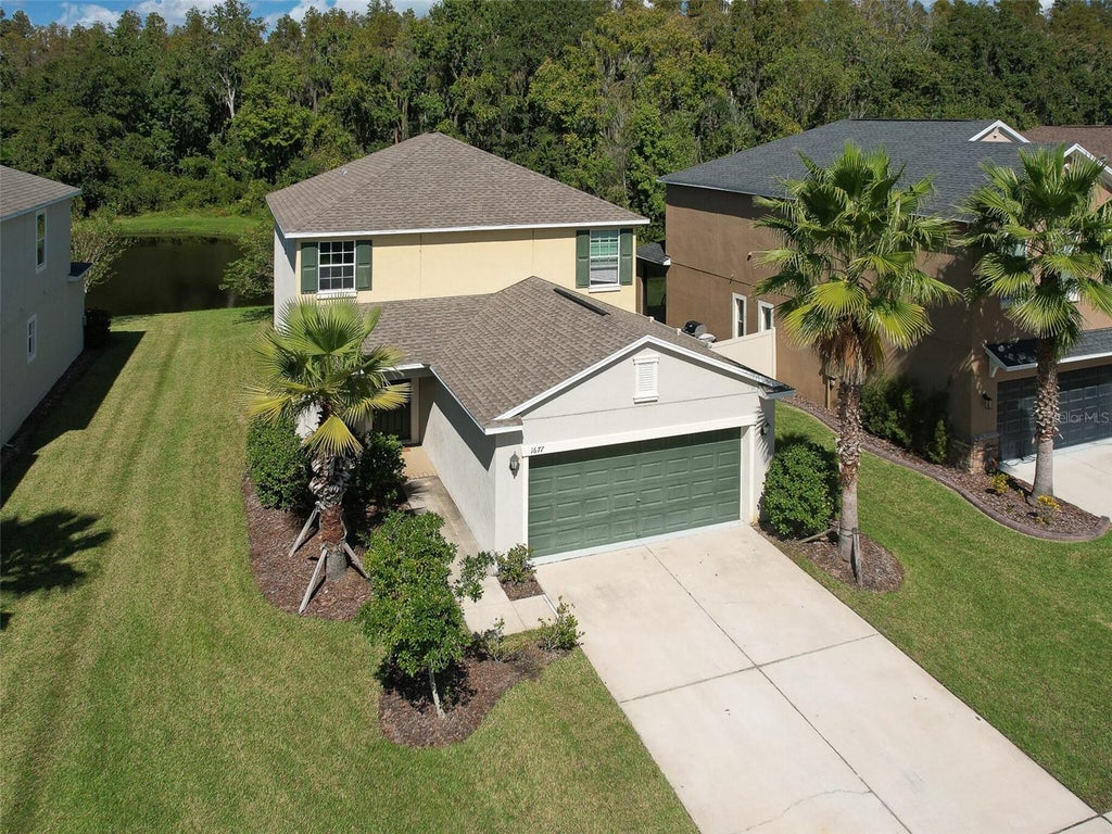 Photo of 1677 Ludington Avenue, Wesley Chapel, FL 33543 (MLS # TB8548224)