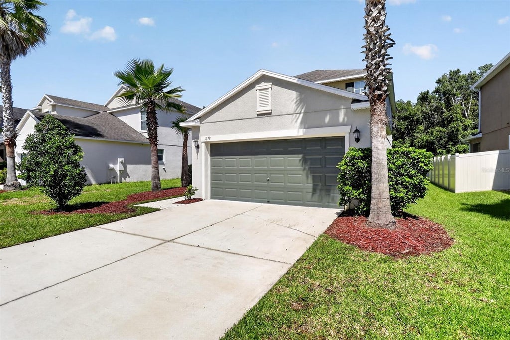 Photo of 1677 Ludington Avenue, Wesley Chapel, FL 33543 (MLS # TB8548224)