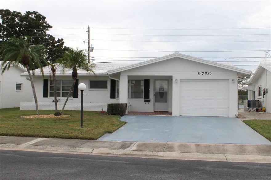 This charming WATERFRONT Drayton model single-family home in the desirable Mainlands of Tamarac Unit 1, offers 2 bedrooms, 2 bathrooms, and a 1-car garage with a double driveway, providing ample parking for you and your guests.

The 1328 sq ft htd home has carpet throughout most of the rooms. The Florida Room boasting a bank of windows that flood the space with natural light and the convenient Breakfast Bar/Pass Thru to the Kitchen creates the perfect atmosphere for relaxation and entertaining. 

One of the highlights of this home is the covered, enclosed, screened-in tiled rear porch, where you can unwind while enjoying the Florida day or evening. Stunning sunsets, wildlife & Freedom Lake are the backdrop of its backyard. WOW! But that's not all! This property comes with a gate accessing the Freedom Lake Park, approximately 15 ft away. Freedom Lake Park offers a fantastic array of amenities, including walking trails, a dog park, and more, ensuring you'll have endless opportunities for outdoor activities and leisure.

The Mainlands of Tamarac is a 55+ golf cart-friendly community that has the Mainlands Golf Course, a public Par 67 'Florida Links' style course located within the Mainlands. With 7 units (subdivisions), each boasting its own clubhouse, pool, amenities, and social clubs, you'll have plenty of opportunities to connect with neighbors and enjoy a wide range of activities.

Pets are welcome in unit 1, with no weight limit, so your furry friends can enjoy the Florida lifestyle with you. It's important to note that while you don't need to be 55+ to own the home, at least one permanent resident must be 55+ with other permanent residents in the same home being at least 40.

Another perk of this wonderful community is that the exterior of the home, including the roof and lawn maintenance, is cared for by the association, allowing you to enjoy a low-maintenance, worry-free lifestyle.

Don't miss the opportunity to make this home your own and experience the best of Pinellas County with its stunning Gulf Coast Beaches; Cultural and Arts Scene; Warm Climate; Outdoor Activities; Dining & Entertainment; Access to Airports & so much more!