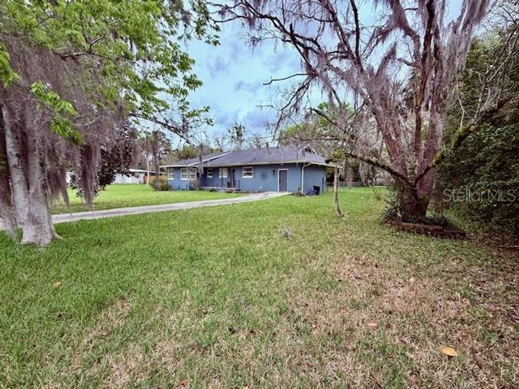 Photo of 215 NW 8th Street, Williston, FL 32696 (MLS # OM721189)