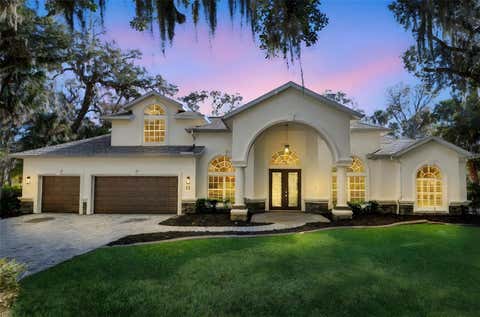 Photo of 11 Cypress Hollow Lane, Ormond Beach, FL 32174 (MLS # O6407416)