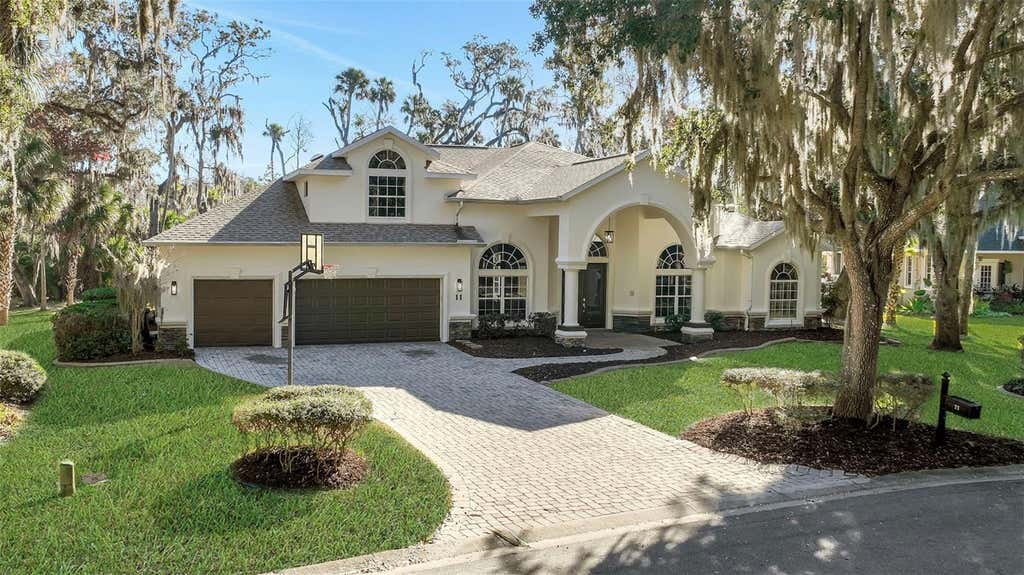 Photo of 11 Cypress Hollow Lane, Ormond Beach, FL 32174 (MLS # O6407416)