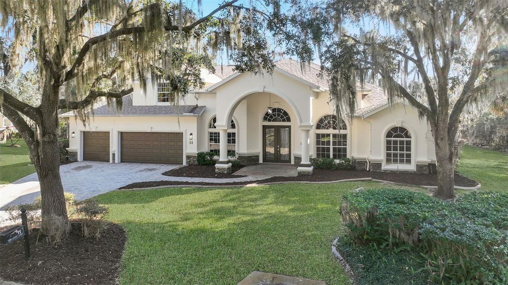 Photo of 11 Cypress Hollow Lane, Ormond Beach, FL 32174 (MLS # O6407416)