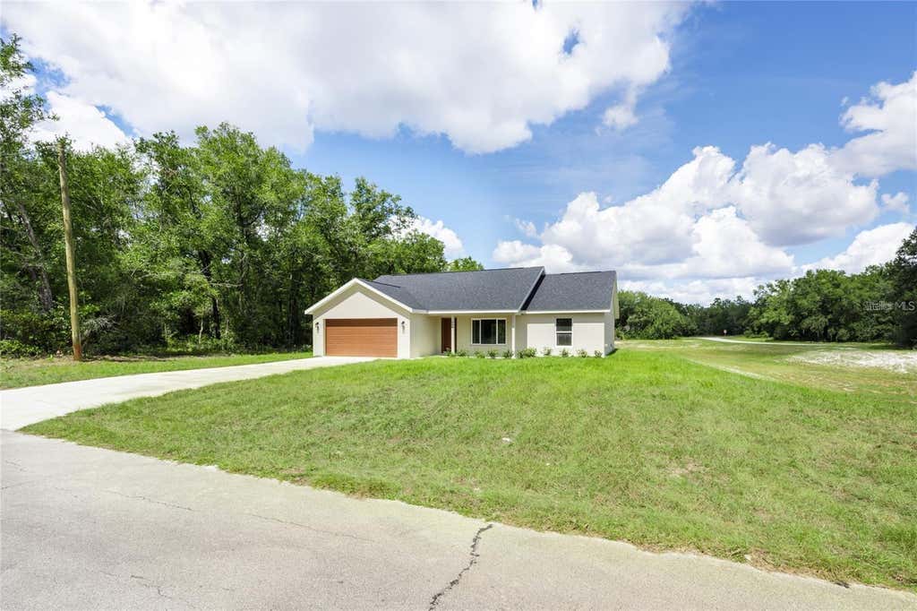 Photo of 15241 S Country Club Drive, Williston, FL 32696 (MLS # GC542278)