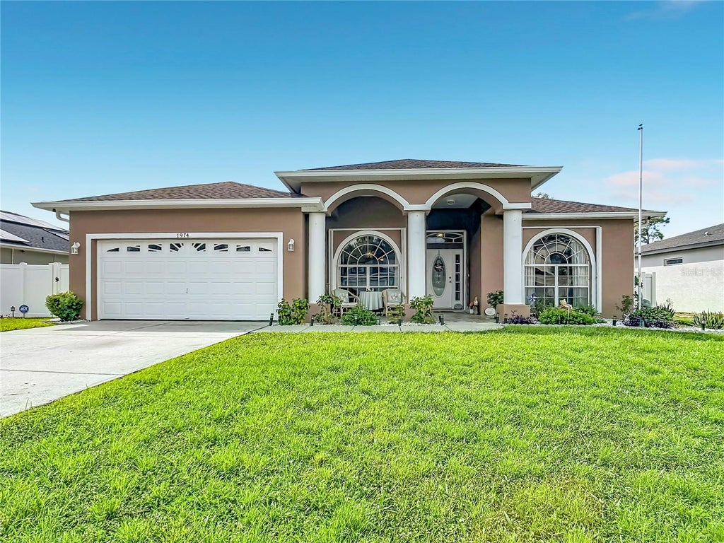 Photo of 1974 Michigan Court, Poinciana, FL 34759 (MLS # L4965209)