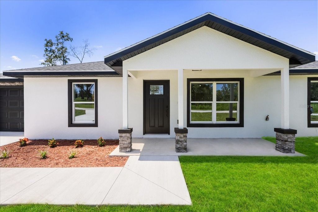 Photo of 5788 NW 57th Court, Ocala, FL 34482 (MLS # O6379347)