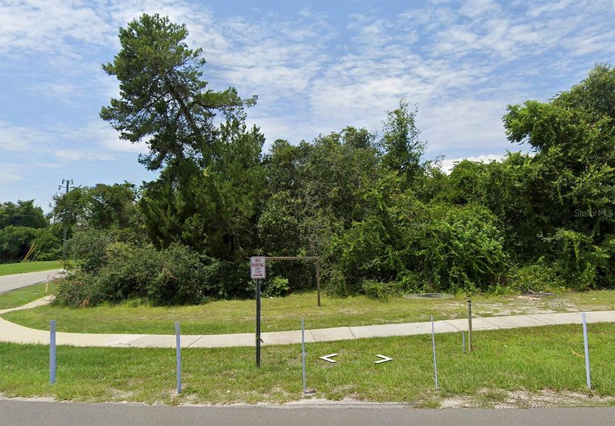 Corner commercial vacant lot close to existing strip shopping center at corner of Elkham and Providence. Lot is corner of Providence and W Chapel Drive. This property is been sold together with the property next to it. See Mls # S5133488, 1854 PROVIDENCE BLVD, DELTONA, FL 32725