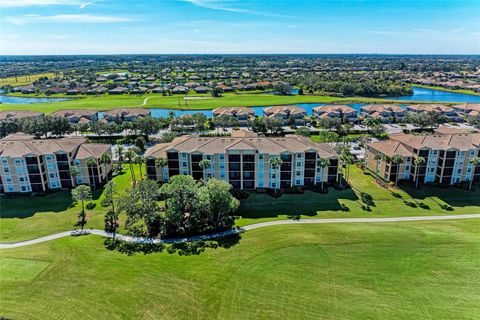 Photo of 8205 Grand Estuary Trail #208, Bradenton, FL 34212 (MLS # A4663075)