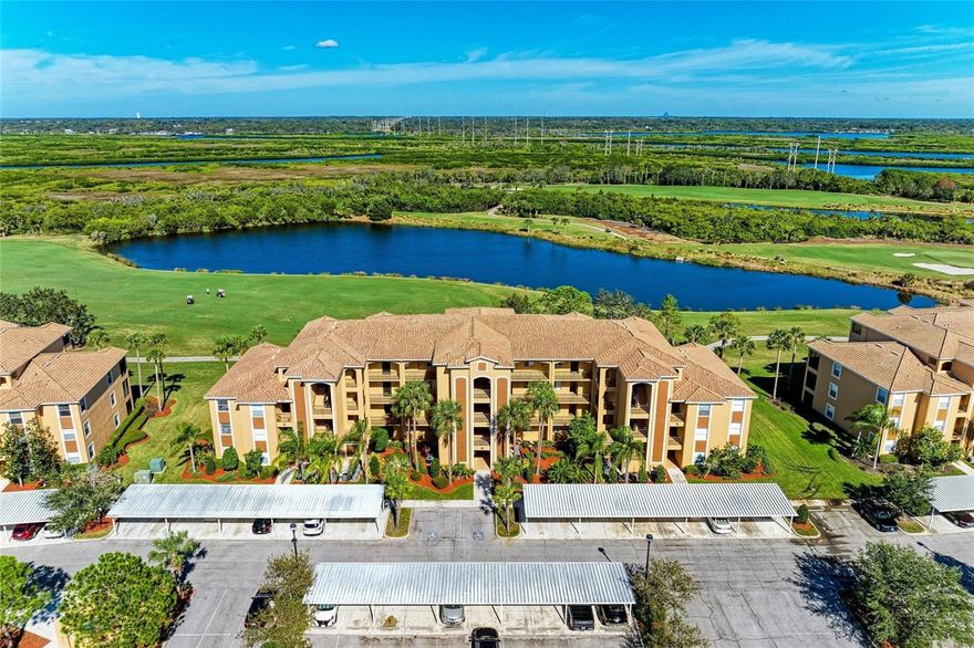 PERFECT LOCATION, GOLF DEEDED, NEWER A/C, TURNKEY AND FURNISHED…. This property has it ALL. Experience refined Florida living with this highly sought-after Colonnade Model—the largest condo design in River Strand Golf & Country Club. Perfectly situated on the second floor, this end-unit residence showcases sweeping panoramic views of the golf course and lake, creating a picture-perfect backdrop for everyday living. Offered turnkey, fully furnished, and move-in ready, the home features a spacious split-bedroom floor plan with 2 bedrooms, 2 bathrooms, and a versatile flex room with a sleeper sofa, ideal as a third bedroom, office, or retreat. The gourmet kitchen boasts BEAUTIFUL cabinetry, granite countertops , stainless steel appliances, and a breakfast bar that flows seamlessly into the open living and dining areas, while a private screened lanai overlooks the 6th hole on the Estuary Course. Elegant upgrades include custom crown molding, designer finishes, and a generously sized storage unit, complemented by a newer HVAC system (2023) for year-round comfort and efficiency. Ownership at River Strand provides access to world-class amenities, including 27 holes of championship golf designed by Andrew Green, two resort-style pools plus six satellite pools, a grand clubhouse with a full-service restaurant, grill room, and tiki bar, two modern fitness centers, 9 tennis courts, 8 pickleball courts, and a year-round calendar of social and fitness activities. Ideally located just minutes from I-75, Costco, shopping, dining, and Florida’s award-winning Gulf Coast beaches, this residence perfectly combines luxury, convenience, and recreation within one of the region’s most desirable communities.
