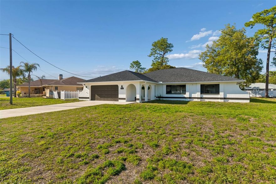 Welcome to this fully renovated 3-bedroom, 2-bathroom pool home offering 2,149 sqft of sleek, modern living with high-end finishes throughout. From the moment you step inside, you’re greeted by a bright, open-concept layout featuring oversized polished tile flooring, recessed lighting throughout, and a seamless flow between the living, dining, and kitchen spaces—perfect for both everyday living and entertaining. The designer kitchen is the centerpiece of the home, complete with a large waterfall-style island, modern cabinetry, stainless steel appliances, and a clean, contemporary aesthetic that opens directly into the main living area.

The primary bathroom feels like a spa retreat, showcasing a freestanding soaking tub, walk-in glass shower, double vanity, and elegant marble-style finishes. Step outside and experience true Florida living with a fully screened-in pool and expansive covered lanai—ideal for year-round enjoyment. The oversized patio offers multiple seating and entertaining areas, all overlooking a private, fully fenced backyard.

Located in a quiet, established neighborhood while still being just minutes from major highways, shopping, and dining, this home offers the perfect balance of privacy and convenience.

Seller is highly motivated—opportunities like this don’t last. Schedule your private showing today.