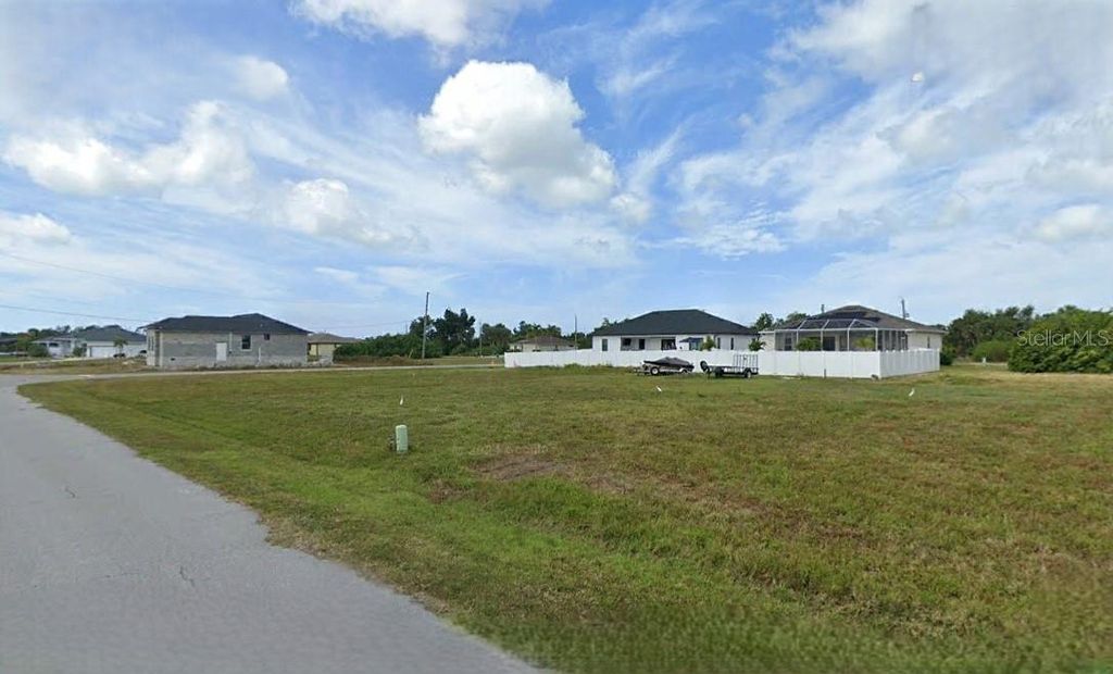 Photo of 116 Temper Lane, Rotonda West, FL 33947 (MLS # O6289461)