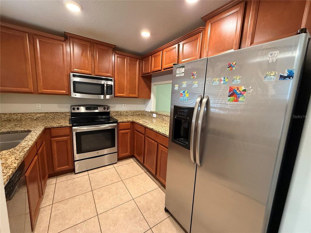 Photo of 9854 Trumpet Vine Loop #9854, Trinity, FL 34655 (MLS # TB8454465)