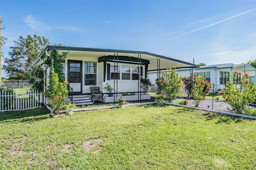 Welcome to this cozy but spacious home that comes FULLY FURNISHED with LOADS OF UPDATES!! **New Updated Full bath ( September 2025) with step in shower, Kitchen has newer raw wood cabinets w/ original hardware (2022), Custom tiled countertops (2022), New Electrical outlets (2022), New drywall (2023), Most windows have been replaced (2023), New Stove and Microwave (2023), New Water Heater (2023), New complete fenced in yard (2023), New Exterior Paint (2022), Brand New Epoxy finished drive & walkway (August 2025), All appliances stay including, Refrigerator, Stove,Microwave & Stackable Washer & Dryer. Primary bedroom has built in desk & drawers. The Tandem style Carport can easily house 3-4 Cars , also has an outdoor Storage/Workshop area. ONLY $350 Annual HOA Dues. PETS ARE WELCOME!! GEM ESTATES is unique to itself with parcel ownership, very spacious lots and is close to shopping and restaurants but also tucked away from the city hustle & bustle. Start packing..this one will not be on the market long!!