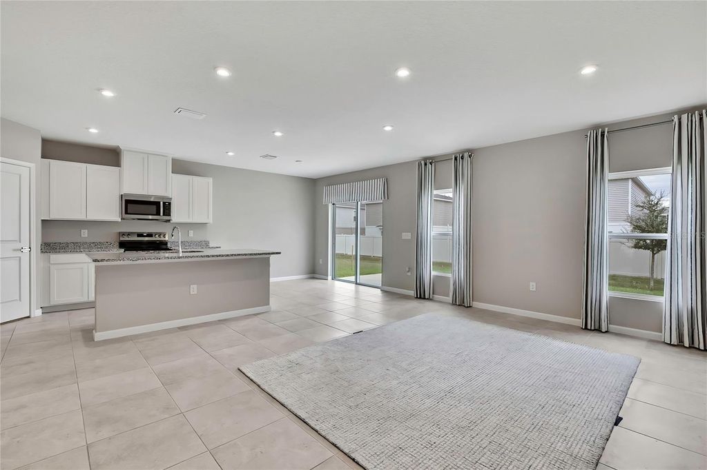 Photo of 1691 Nebraska Loop, Summerville, FL 33585 (MLS # TB8452921)