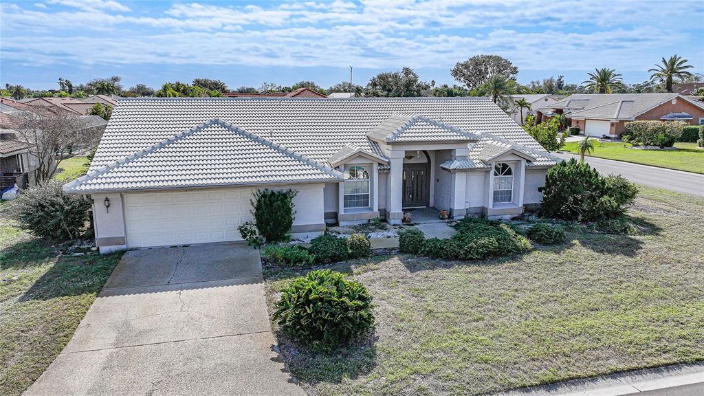 Photo of 401 Firethorn Avenue, Englewood, FL 34223 (MLS # C7520702)