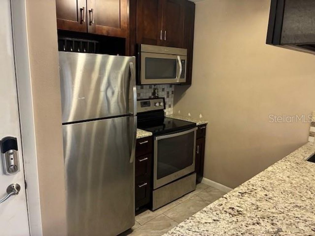 Photo of 3806 N Oak Drive #V21, Tampa, FL 33611 (MLS # A4681043)