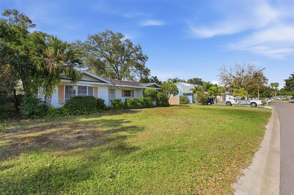 Photo of 2310 Harrison Drive, Dunedin, FL 34698 (MLS # TB8465732)