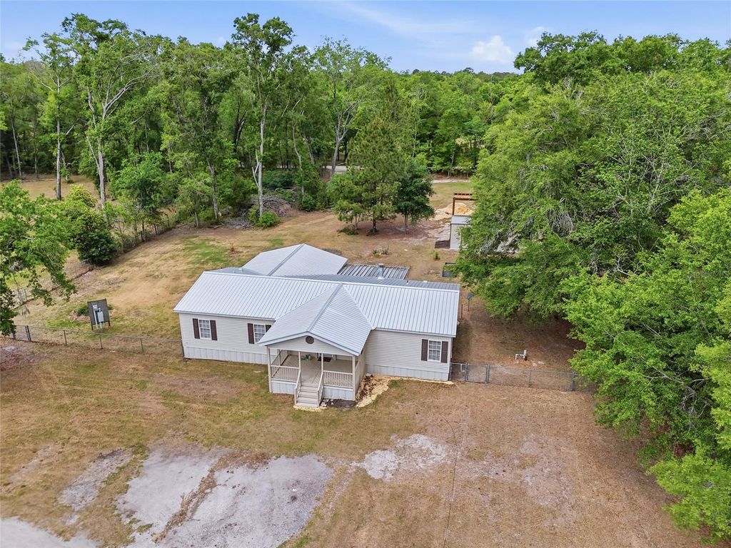 Photo of 9528 NW 235th Terrace, Alachua, FL 32615 (MLS # GC540282)