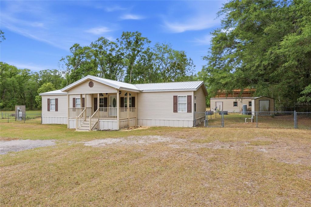 Photo of 9528 NW 235th Terrace, Alachua, FL 32615 (MLS # GC540282)