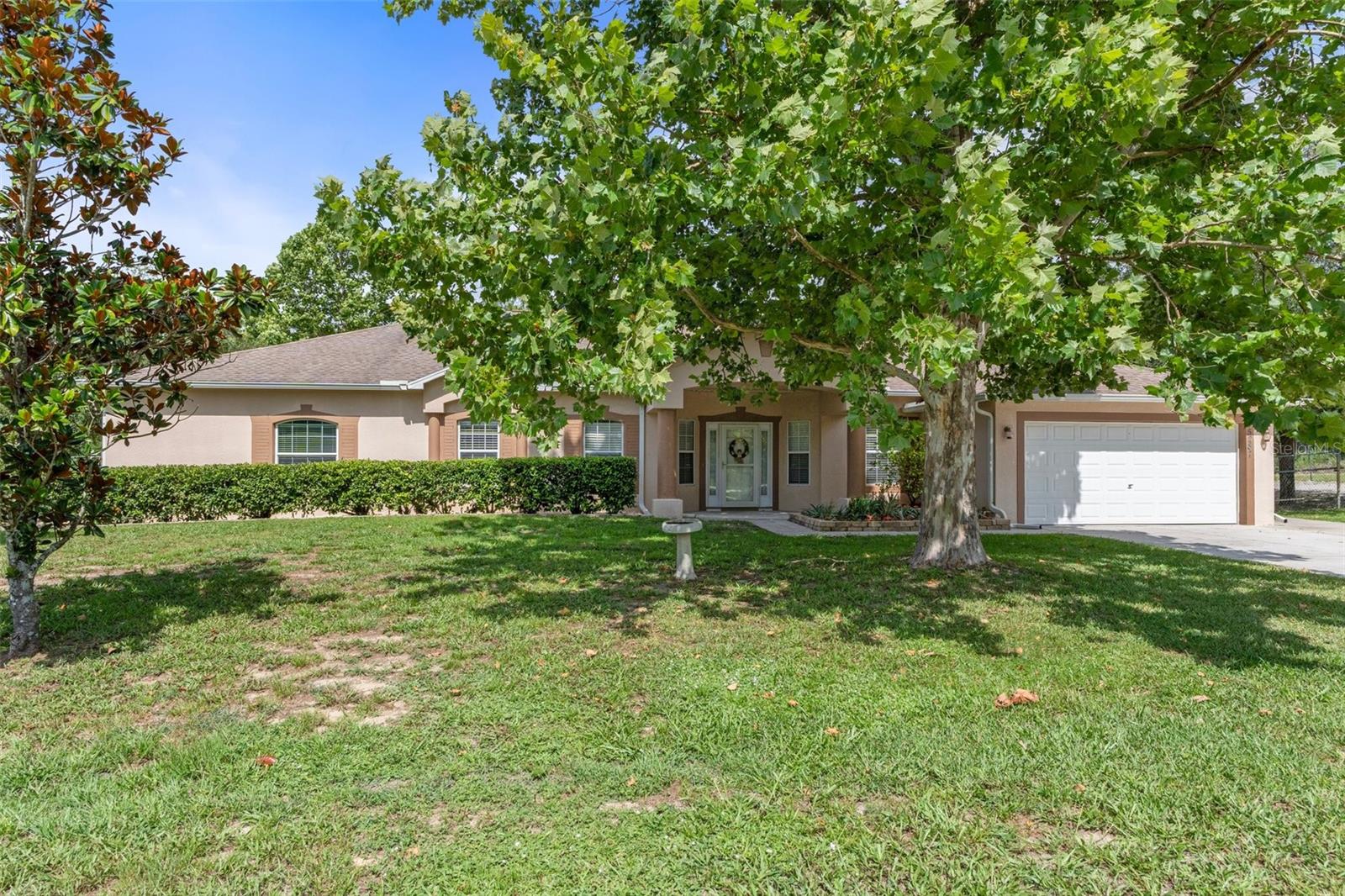 Check out this Incredible 5 Bedroom, 3 Bathroom 3+ Car Garage with over 4,500 Square Feet under roof is Ready for You & Your Family with a Separate In-Law Suite with Private Entrance!! This Luxurious Open Concept Home with Split Plan 3/2 Home has an Attached but Separate In-Law Suite with 2 Bedrooms, 1 Handicap Accessible Bathroom and includes Full Kitchen, Additional Laundry Room, Family Room & Private Entrance!!
This Royal Highlands Custom Built Home sits on a Gorgeous Lot of over a 1/2 acre and includes a 400 Sq Ft 2-Story Workshop/Garage, RV/Boat Parking, Security Lighting, Fully fenced with a Dog Run and Additional Dual Gates (10’ & 15’) and so much more! As you enter the Main Home, you have a Separate Dining room Plus and a Separate Office that can be used as a Media Room or Bedroom and more. The Huge Living Room is fully open to the Kitchen & Dining area and a great view of your HEATED 28 x16 SPORTS POOL with depths of over 6 Feet!!
Check out the Chef Inspired Kitchen with Endless Counterspace and mini Butler Pantry in the Inside Laundry Area. Enjoy many of Holidays with Family & Friends in this beautifully laid-out Kitchen and eat in Dinette Area or step around the corner to your private Dining room.
Off the Kitchen is pure Royalty with your Primary Master Suite. Enjoy Your Private Bedroom & Bathroom with a stunning Ensuite and Custom-Made Closet Designs in your Spa Like Retreat!! This home has Endless Storage and many High-End Custom-Built Closet Organizers & Shelving Units throughout!!
Bedrooms #2 & #3 are on the other side of the Home and are Very Large with more Walk In Closets with Custom Built-Ins. Inside Laundry Room and more storage completes the Main part of the Home. Attached to the Main Home is this Incredible In-Law Suite custom Built with Everything!
Your Outdoor Oversized, Heated Sports Pool Retreat Area is designed with Custom Pavers, Screened Enclosure, 2 Separate Areas to Entertain, great for Grilling & Relaxing. The backdoor opens up to the yard Family S’more-Kind of night Fire Pit area for relaxing under the Stars!! No neighbors to the left and land in the back owned by Swiftmud, So Much Privacy abounds with this Home!! Well has a storage protection unit built over it to protect it from the Florida Sun & Elements. Home also has hurricane shutters for all the windows for the home.
With only a 10 Minute drive to Weeki Spring Springs State Park, Buccaneer Bay, Pine Island, Hernando Beach, this ideal property can also be used as income producing. With the main Home having its own entrance, the Homeowner can AIRBNB & VRBO the 2/1 In-law suite Endless Income Potential.
Hernando County is one of the Top & Most Unique areas of Florida with Fresh, Salt & Brackish Waters, to Blue Springs, Rivers and Gulf of America areas… Perfect for the Boating/Fishing/Swimming/Kayaking Enthusiasts. Enjoy top Hiking & Biking areas, best of Medical & Shopping Facilities, Award Winning Dining & Wineries/Breweries and quick access to International Airports, Shopping, and other facilities, this home is a Game Changer offering something for everyone!!
Hurry & schedule your showing today!! It will go fast with these unique features not found on any other current listing on the market in the area!!