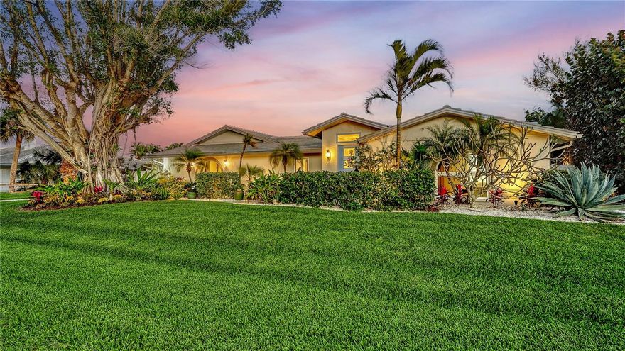 Welcome to an extraordinary south Longboat Key canal front estate in Country Club Shores, located 2 in from Sarasota Bay on a lushly landscaped 1/3 acre lot, where luxury and tranquility come together in perfect harmony. This residence is the ultimate sanctuary, blending refined modern design and extraordinary finishings with the serenity of its picturesque surroundings. Untouched by recent hurricanes, this home features impact windows and high-quality craftsmanship and is built to withstand the demands of south Florida’s climate. The completely renovated ~3,000 sq ft, 3-bedroom, 3-bathroom property is outfitted with premium finishings and an open plan that sets new standards for convenience and today’s modern lifestyle. From the cozy media room with wet bar and separate office, to the pro-outfitted chef’s kitchen and owner’s suite that is a truly an inspiring spa-like retreat, every inch of this home exudes luxury and comfort. The home has been thoughtfully renovated, featuring large plank porcelain floors and 10’ ceilings adorned with custom millwork details throughout. Plan to be impressed by the formal foyer that delivers your guests to the spectacular “Art Salon” and spacious gathering area. The gourmet kitchen is a chef's dream, featuring a stunning 9’ Dolomite Island with a vegetable sink and a 30” Fisher-Paykel dishwasher drawer adjacent to custom dual pantries. The custom built-in Thermador refrigerator/freezer columns, warming drawer, and microwave provide everything needed to prepare any culinary creation with ease.  The Carrera marble backsplash complements the quartz countertops that house the commercial grade Thermador 6-burner gas range and griddle with 2 convection ovens. The kitchen area features 12-foot bifold impact door panels and 8-foot bifold impact windows, which can be fully opened to seamlessly connect the kitchen with the patio area and stunning Bay views.  The owner's retreat offers a relaxing Zen atmosphere with soft tones that complement the water views. Escape to the spa inspired bathroom to indulge in a two-person freestanding hydrojet bath or relax in the spacious aroma steam shower featuring dual rain showerheads and hand showers. The blue calcite custom vanities illuminate the ethereal experience, complemented by a Toto Neorest water closet and a custom walk-in closet. The media room is perfect for movie night, featuring surround sound and wet bar with a wine captain. The two spacious guest suites feature spacious bathrooms with floor to ceiling large format porcelain tile, Hansgrohe/Gessi fixtures, marble and Cambria quartz countertops, and mosaic marble backsplashes. The baths also feature Restoration Hardware towel curios with matching pulls, oversized rain showerheads with custom finishes. Outside is a 110-foot seawall and versatile dock system, that includes an entertaining area, mooring station with shore power pedestal/water, and a floating dock perfect for launching kayaks or boarding a boat. The spacious greenhouse offers a sanctuary for relaxing and all your planting needs delivering that boujee-chic retreat embellished with orchids and herbs to further elevate the experience. Located on the highly desired south end of Longboat Key, adjacent to the Resort at Longboat Key Club and nearby St Armands Circle, this property includes deeded beach access and unrivaled convenience to Sarasota. Call now for a private tour of this bespoke property.