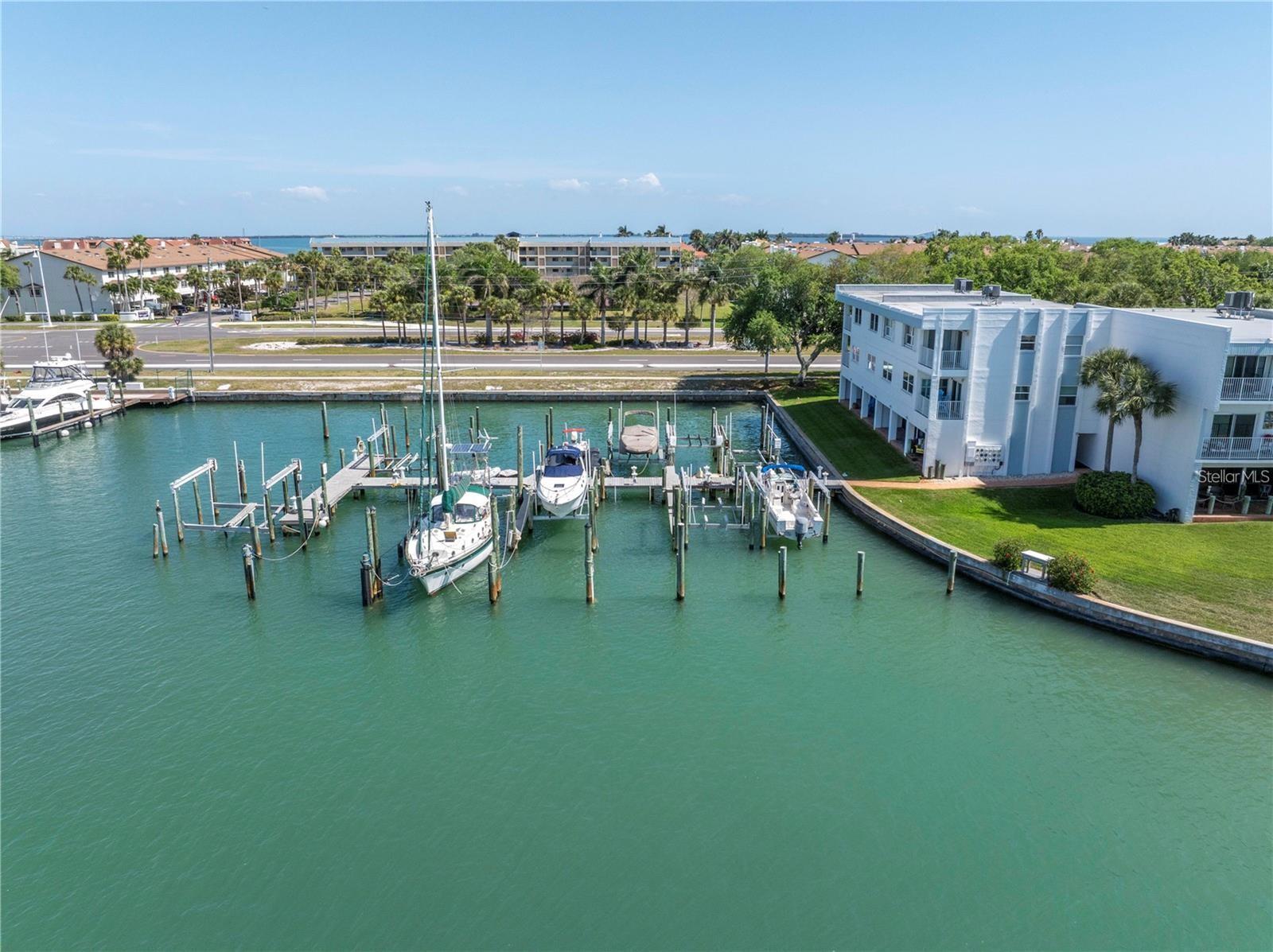 Looking for a waterfront property with a boat slip on the Grand Canal? Experience Gulf coast
living in this tastefully updated top-floor condo in the Yacht Haven community. With recent
upgrades throughout, this unit offers a perfect blend of style and functionality, creating an
inviting retreat for those seeking the best of Florida’s waterfront lifestyle.
As you step inside, the thoughtfully remodeled kitchen seamlessly connects to the open dining
and living areas, creating a warm and welcoming atmosphere. The living room is a highlight,
featuring crown molding, wide baseboards, and stylish door casings that are small glimpse into
the details throughout. Impact sliding doors open to the balcony that spans the entire length of
the unit, offering stunning views of the Tierra Verde Grand Canal; a perfect space for relaxation
or entertaining.
The primary bedroom is equally impressive, with its own access to the balcony through impact
sliding doors, a beautifully updated en-suite bathroom, and a spacious walk-in closet with
custom built-ins. The attention to detail throughout the condo creates a serene sanctuary for
ultimate comfort.
The guest bedroom and bath, along with a tucked-away laundry room, ensure privacy and
convenience for both residents and guests. A well-placed pocket door offers the option to create
a private suite, enhancing the sense of space and exclusivity.
Another standout feature is the prime boat slip included with the unit. Just steps away, the
approximately 45-foot boat slip provides deep water access for boating enthusiasts and offers
quick, direct access to the Gulf of Mexico. A true boater’s paradise!
Beyond the unit, a large bonus cabana and flex area provides additional space and
convenience. The open-air deck and screened cabana lead to the heated pool, offering a
fantastic spot to unwind and enjoy those sunny days.
The building has seen recent upgrades, including new railings and waterproofing of the
walkways. Located just minutes from Fort De Soto Park and the soft, powdery sands of St.
Pete Beach, this condo offers the best of both worlds: waterfront living with easy access to
some of Florida's most beautiful natural areas.
This updated, well-maintained condo offers a unique opportunity for refined coastal living,
combining comfort, convenience, and exceptional waterfront access.