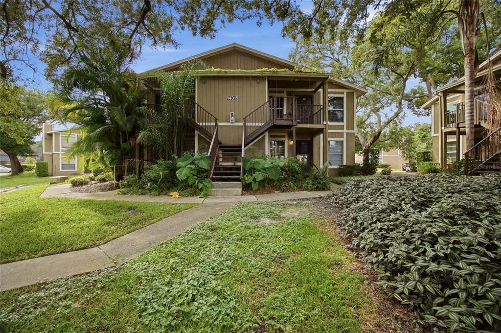 Photo of 14315 Hanging Moss Circle #101, Tampa, FL 33613 (MLS # TB8541235)