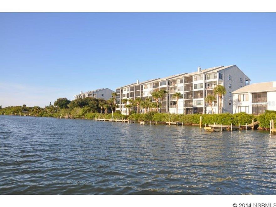 Beautiful direct riverfront corner unit in small complex that features boat dock, boat launch & easy access to car-free beach.  Granite & stainless kitchen.  Granite baths.  Two separate porches overlooking the river. Waterviews from all rooms.  Kitchen & guest bdrm enjoy river & ocean views.   Master suite opens to private riverfront balcony.  Livingroom opens to screened riverfront porch.  Offered fully-furnished (a few items excluded)  turnkey, absolutely gorgeous!  Deeded garage.   Enjoy County park close-by with volleyball, basketball & playground, too. ;LocationDescription: Condo ;Water: City