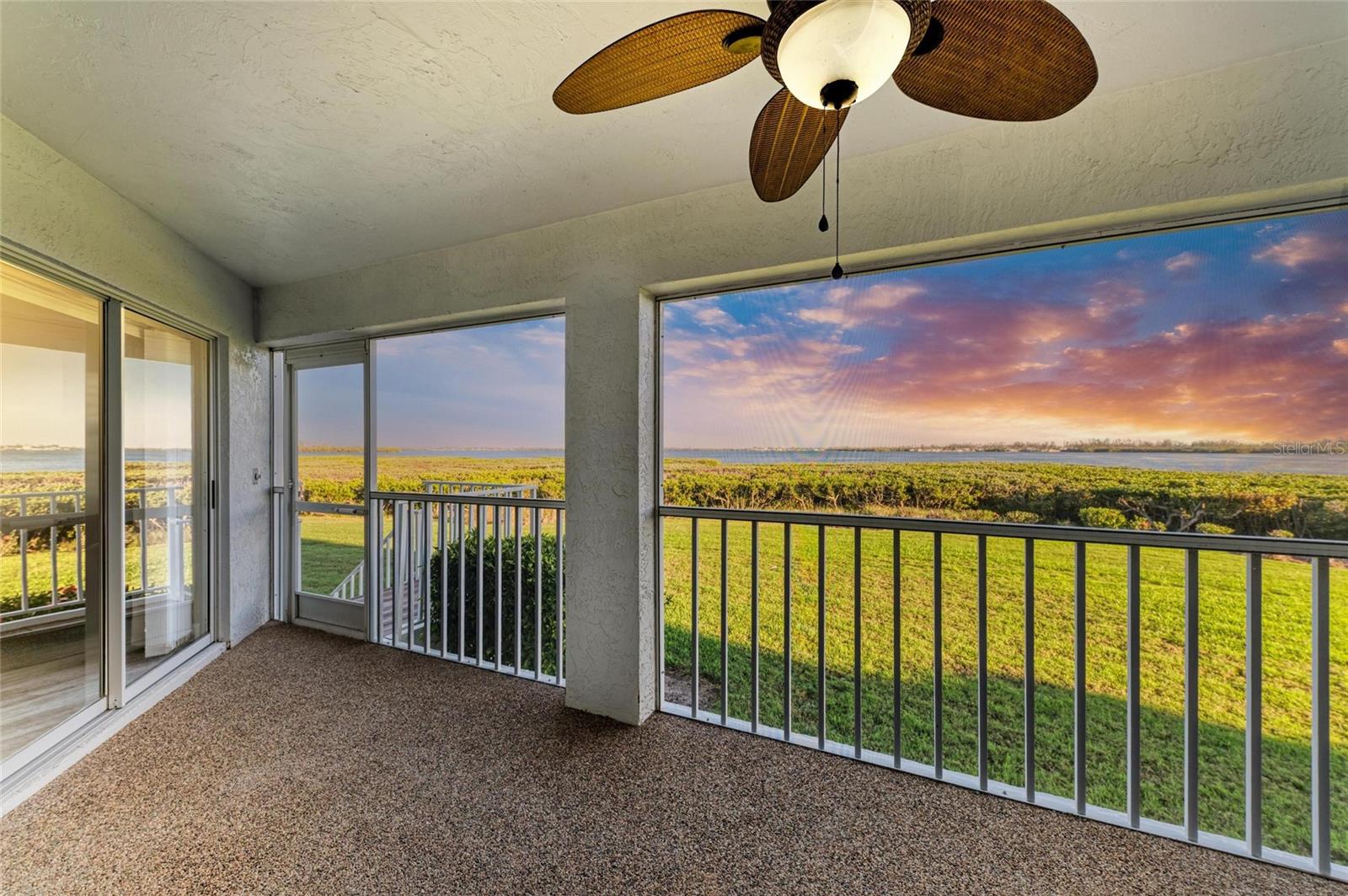 Spectacular water views await you when you enter this immaculate bayfront two-bedroom, two-bath, first-floor unit in Perico Bay Club. Pride of ownership is evident in this newly updated 1,334-square-foot condominium. All updates are completed for you, including new luxury vinyl flooring throughout, new quartz counters in the kitchen and both baths, newly repainted kitchen cabinets, new vanities and mirrors in both baths, new air-conditioning unit and water heater, new interior and exterior paint, plus plantation shutters on all windows. This home sparkles with bright natural light entering every square inch of this property. This home has a spectacularly well-designed great room concept floor plan with foyer entry, open living and dining areas, kitchen with stainless steel appliances, soft-close drawers plus a breakfast nook area and a slider-enclosed screened lanai with amazing turquoise blue water views for soaking in the bay breezes and for enjoying that ideal indoor-outdoor Florida lifestyle. The split bedroom floor plan adds privacy, with the primary bedroom having breathtaking waterfront views. The primary bedroom suite is spacious, including additional room to relax and enjoy the bay views and an en-suite bath with dual sinks, walk-in shower and walk-in closet. The guest bedroom is ideal for family, friends or your personal office workspace. This beautiful property also has plenty of storage space, a new washer and dryer, and a one-car garage with extra storage space for beach toys, bikes and more. There are plenty of options to stay healthy and active in this community and enjoy the beautiful Florida outdoors. Perico Bay Club offers miles of recreational trails, a bird sanctuary, multiple community pools, an active clubhouse with many social events, fitness center, four lighted tennis courts, pickleball courts, shuffleboard, and direct water access paddleboard and kayak launch with storage and more. This well-maintained exclusive enclave of homes is also gated and staffed with a personal guard for extra security and privacy. Your condominium fees include exterior maintenance, cable, internet, water, sewer and trash. Plus, a new roof was just installed three years ago. In addition, this property is in a prime location, only minutes from Anna Maria Island and the best beaches, restaurants, shopping, arts and entertainment in the area. The furniture is available to purchase on a separate contract. Call us today to see this slice of paradise!