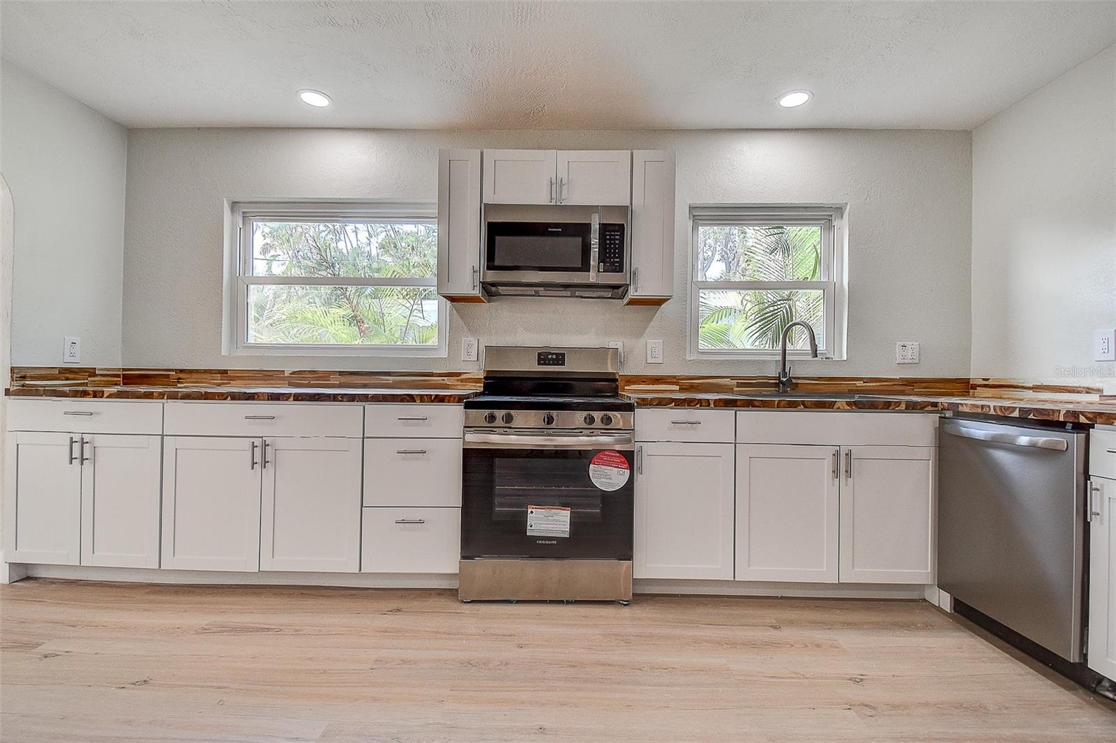 SUN-LIT SHORES - Residential