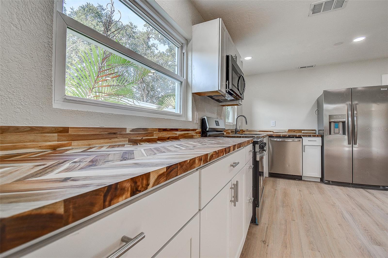 SUN-LIT SHORES - Residential