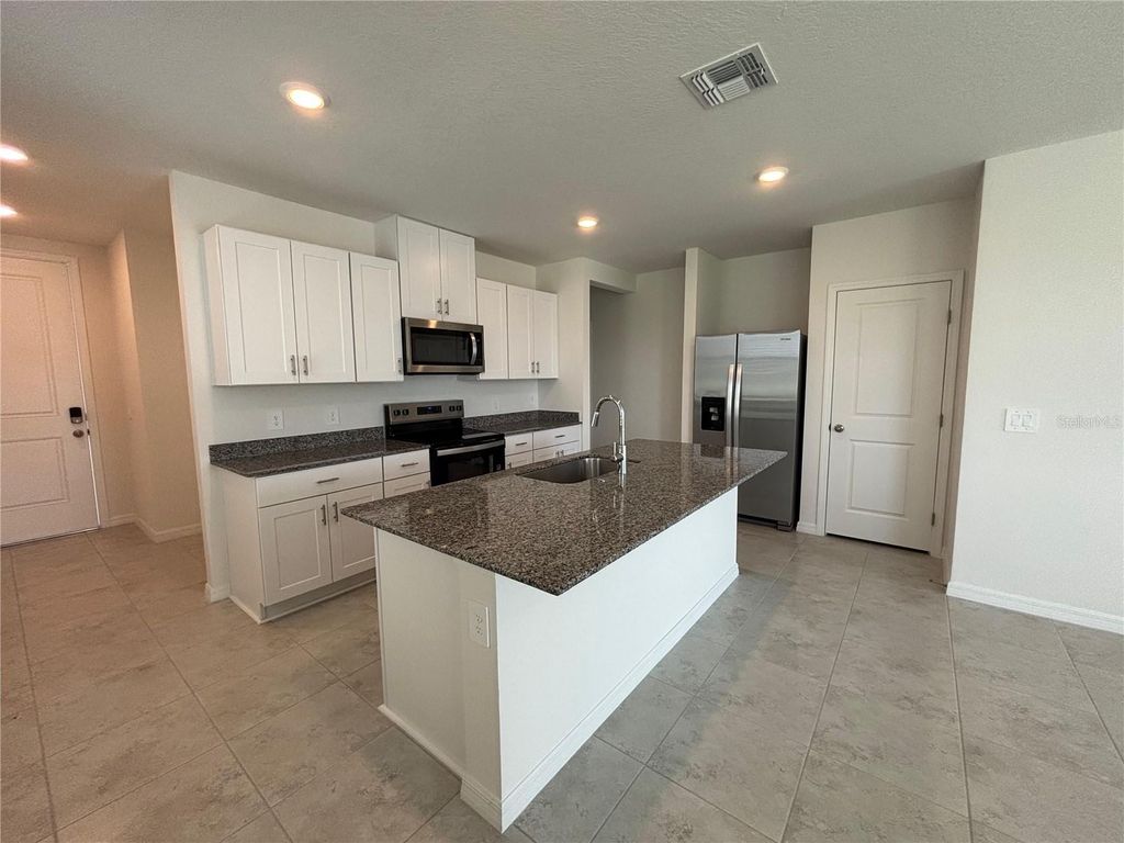 Photo of 5526 Clove Row, Haines City, FL 33844 (MLS # O6398192)