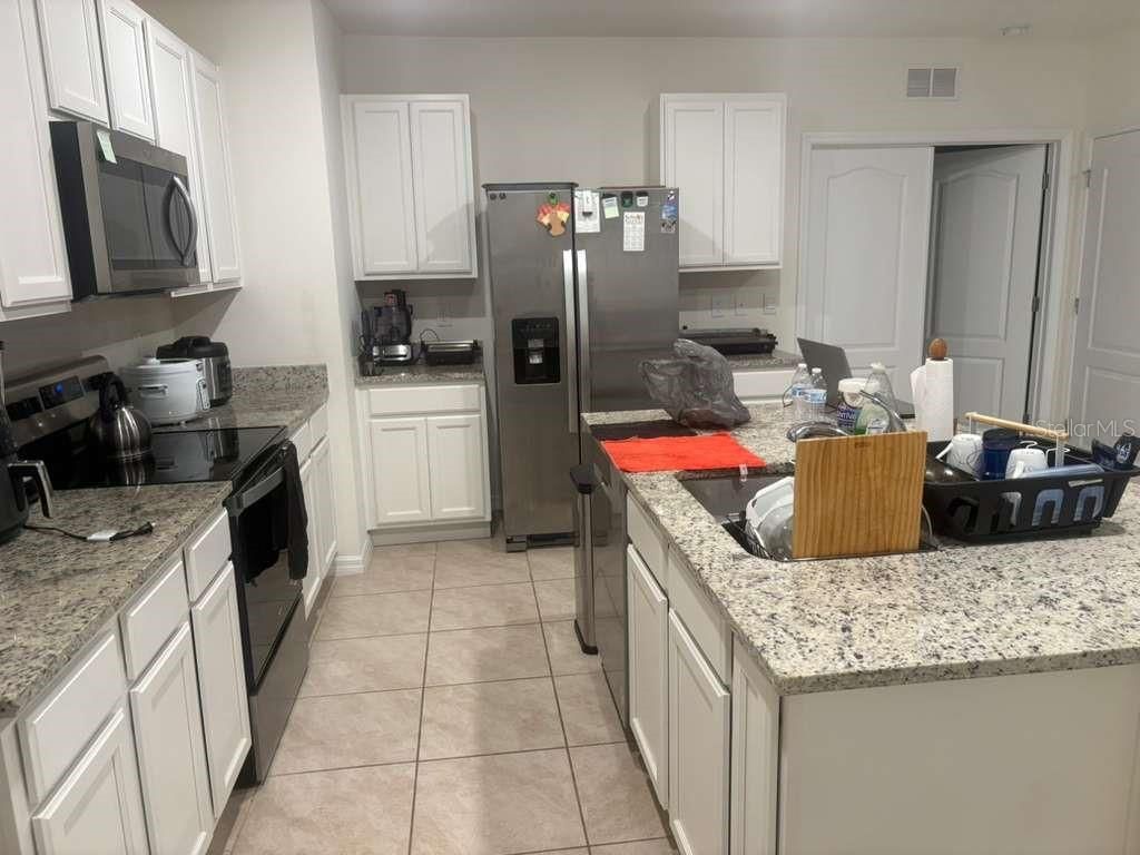 Photo of 2343 Aquiline Nest Street, Eagle Lake, FL 33839 (MLS # O6393122)