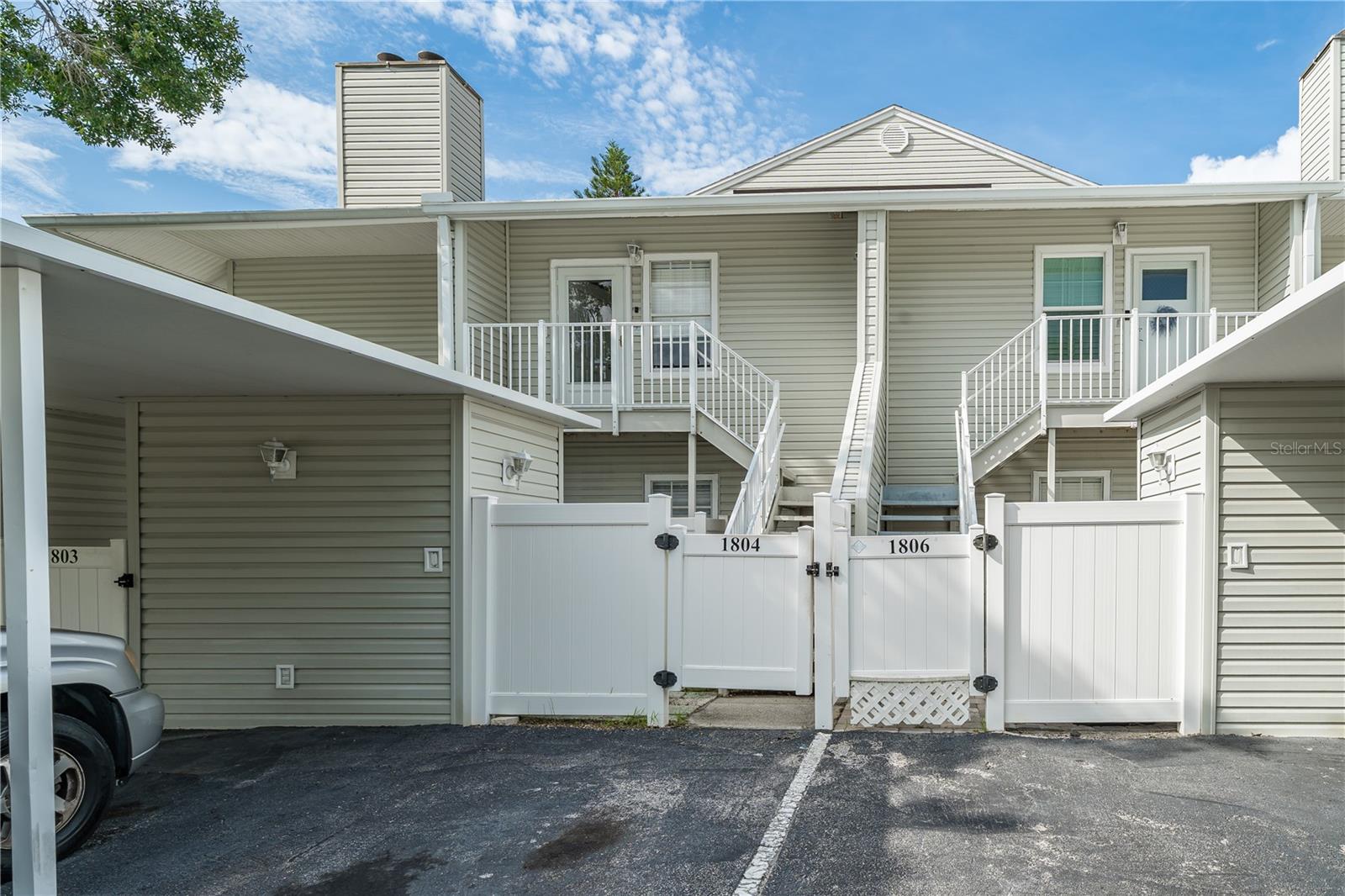 This spacious 1,325 square foot condo, located on the second floor of the Savanah Trace Condo community, is conveniently situated off Memorial Highway. The unit features 2 bedrooms and a den that can easily be converted back into a third bedroom. It includes 2 bathrooms and offers an open-concept floor plan.
The kitchen overlooks the breakfast area and family room, which has a cozy fireplace and access to a screened-in balcony. The laundry closet is conveniently located just off the kitchen and provides extra storage. The large second bedroom has sliding doors leading to a private screened balcony.
The condo is finished with tile and laminate flooring throughout, ceiling fans in the bedrooms, den and family room, and includes a small courtyard with a storage shed. There are 2 assigned parking spaces right in front of your gated courtyard—
one covered and one uncovered. The condo fee covers water, sewer, trash collection, exterior maintenance, roof replacement, grounds maintenance, and the maintenance and service of the community pool. This location is centrally located near major highways and bridges, Tampa International Airport, malls, Downtown Tampa, Channelside, and medical facilities, offering an easy and quick commute to St. Petersburg.