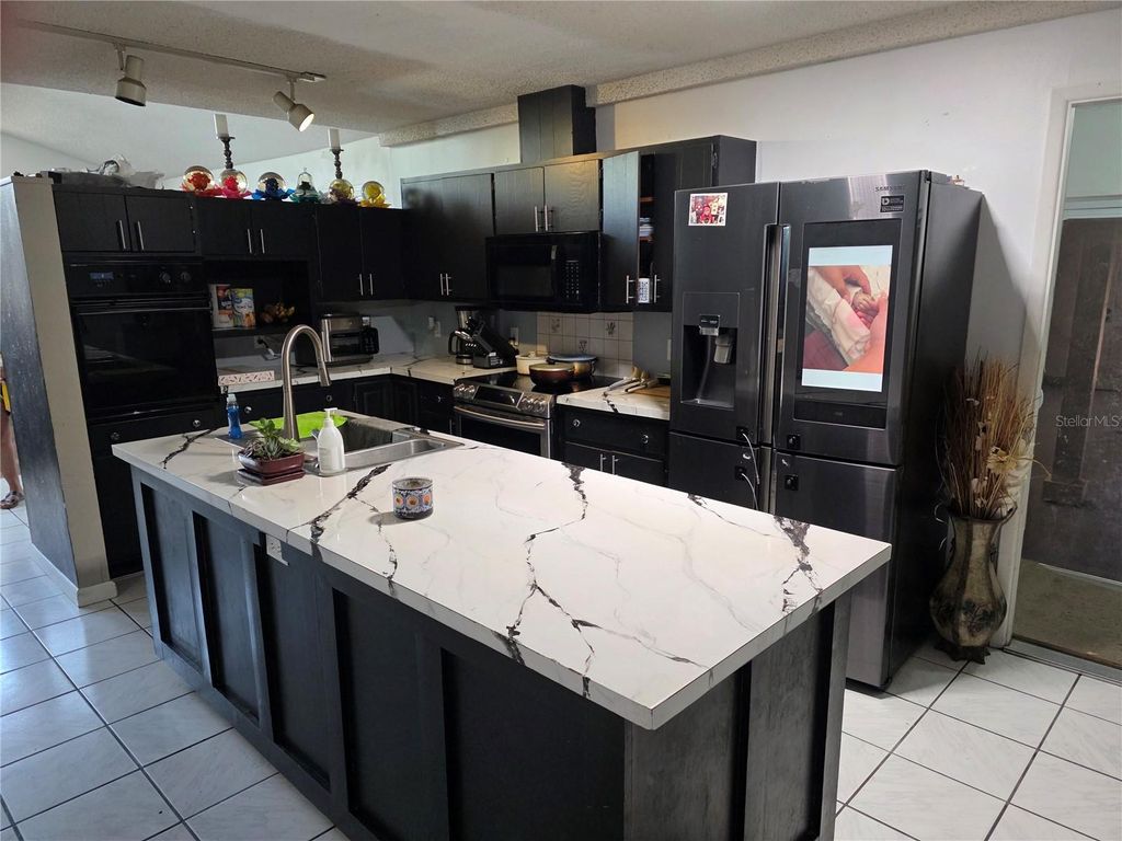 Photo of 142 NE 112th Avenue, Old Town, FL 32680 (MLS # TB8504553)
