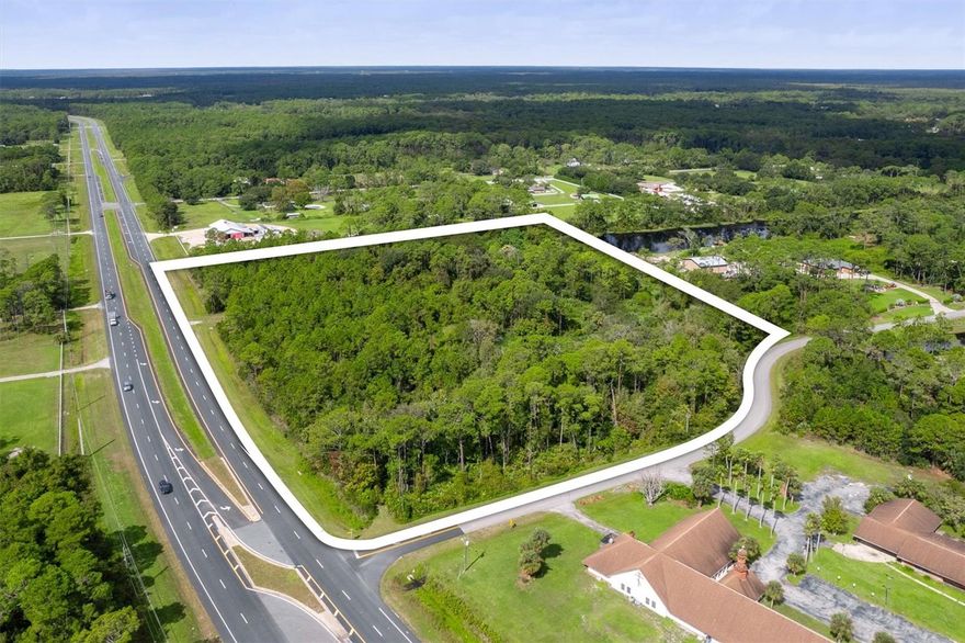 Discover the endless possibilities of this expansive 11 acre property along SR-40 in Ormond Beach. This prime location is perfect for your dream estate or a lite commercial venture that captures the attention of passing motorists. This property offers over 845 ft of frontage on SR-40, A-2 zoning and a daily traffic count of 7,780. Imagine building your ideal residence with ample space for all your favorite hobbies or consider rezoning for a business that thrives on visibility and accessibility. Current zoning information available upon request. Enjoy the convenience of being just minutes from the beach and I-95, providing easy access to shopping, dining, and entertainment. Don't miss this incredible opportunity—welcome to your future!