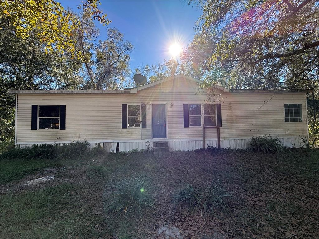 Photo of 132 Pond Side Trail, Hawthorne, FL 32640 (MLS # OM715035)