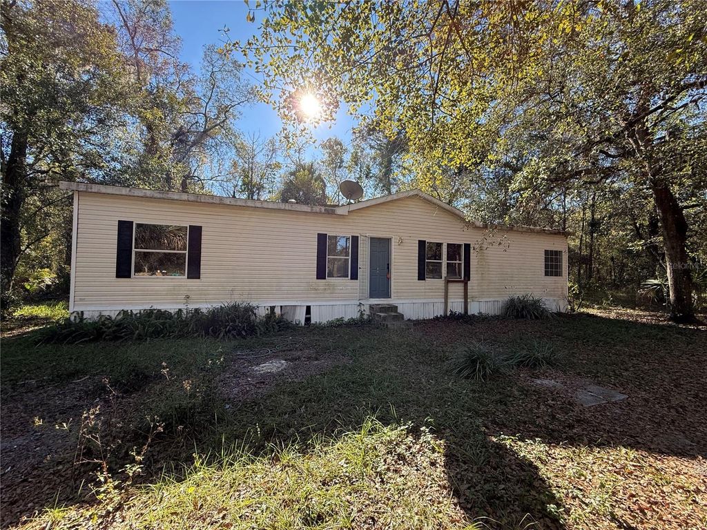 Photo of 132 Pond Side Trail, Hawthorne, FL 32640 (MLS # OM715035)