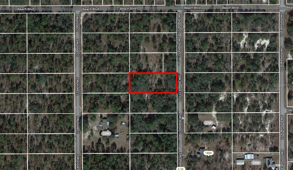Under contract-accepting backup offers. Build your DREAM home on this one acre lot in the quiet and established neighborhood of RAINBOW LAKES ESTATES in Dunnellon. This community offers many extras including a clubhouse, community center, youth center, library, park, boat ramp, 2 lakes that feature a dock for fishing or watching the sunset and a beautiful gazebo for a picnic and with Paved road access it's a short drive to local area shopping, restaurants and amenities. Bring your BOAT or RV! NO HOA!!!!