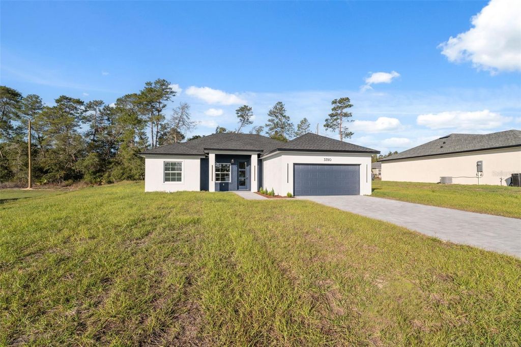 Photo of 3350 SW 129th Loop, Ocala, FL 34473 (MLS # O6359656)