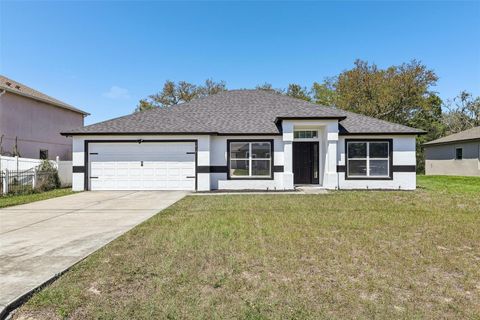 Photo of 1412 Sarasota Drive, Poinciana, FL 34759 (MLS # O6401277)