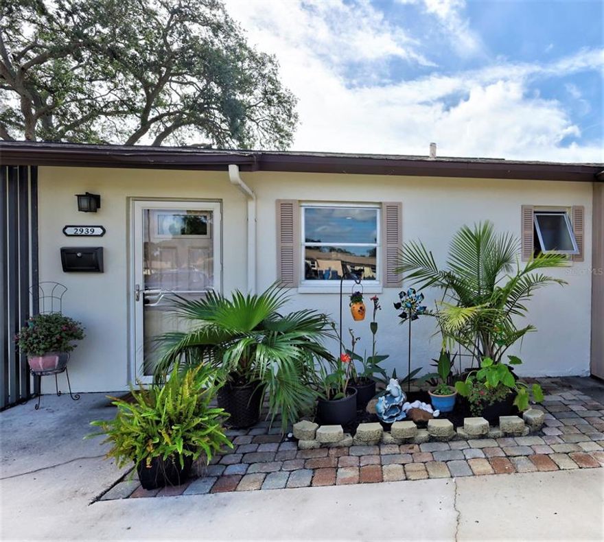 Swifton Villas is an active +55 community with access to many Sarasota attractions. This lovely villa has been very nicely upgraded. There are crown moldings and larger baseboards to enhance the appearance, also ceramic tile throughout. The kitchen has also been updated with a stainless stove exhaust hood. The hot water tank was replaced in 2020 and the washer/dryer is new in 2022.  Just installed this fall is a new impact resistant front door.  Detwiler's Farm Market and shopping center is located just a short walk from the lanai through a private gate with coded access. You are minutes away from award winning Siesta Key Beach for sunning, swimming, and sunsets; the Intracoastal Waterway for kayaking, fishing, and power boating; the Legacy Trail for biking, running, and walking; and lastly a short distance to fabulous restaurants from your home to downtown Sarasota.  Welcome Home!