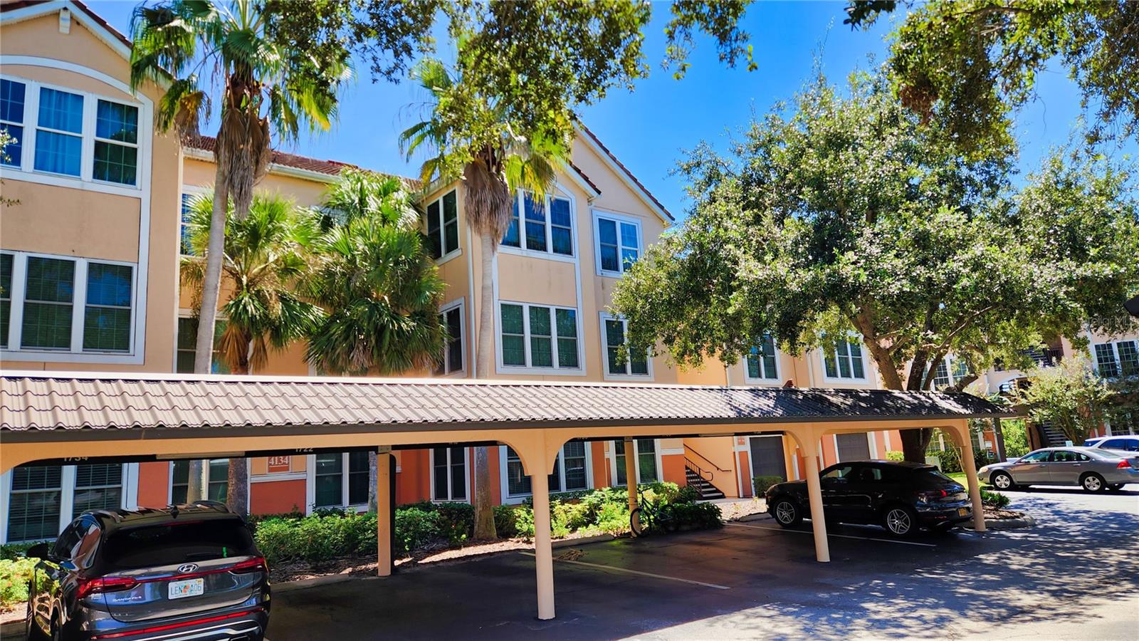 GREAT VALUE and COASTAL LOCATION CLOSE TO THE TOP-RATED U.S. BEACH ON SIESTA KEY! This large 2 bedroom, 2 bath end-unit condominium home has an open floor plan with an extended living room. It is on the 3rd floor (top floor), so no one will be living above for privacy and quiet! The floor plan has split master suites, one on each side of the living area which is centered around the kitchen’s breakfast bar. The oversized living room includes a solarium which is an extension to the living room and has 5 windows that make it light and bright, with a western sunset view! The solarium is commonly used as a den, home office or study. The kitchen is well sized with a pantry and breakfast bar that opens on the side to the dining area. The split plan master bedrooms have en suite bathrooms with walk-in closets, and a linen cabinet in the common bathroom. There is a separate laundry room just off the foyer entry with a full size washer and dryer and some room for storage. The home comes with an assigned, lighted carport (there are unassigned parking spots for guests). The home is within the gated community named “Bella Villino Condominiums” which is located in the award winning, master planned development of “Palmer Ranch”. The community boasts superb amenities not available at comparable properties in this price range and features an elegant clubhouse with resort style heated pool and spa, large fitness center with state of art equipment including cardio machines with a tv, indoor racquetball and basketball, billiards room, and business center. The community has a tennis court, pickleball, car detail area, gas grills with picnic areas, pet stations located around the property, an onsite manager and maintenance staff. It is close to world class beaches, marinas, the popular Legacy Trail (bicycle/jog/walk), shopping, restaurants, golf courses and much more.